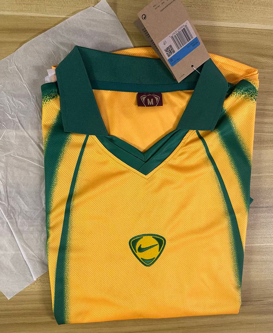 2026 Brazil x Scott Cactus Jack Total 90 Yellow Retro Soccer Jersey detalj 2